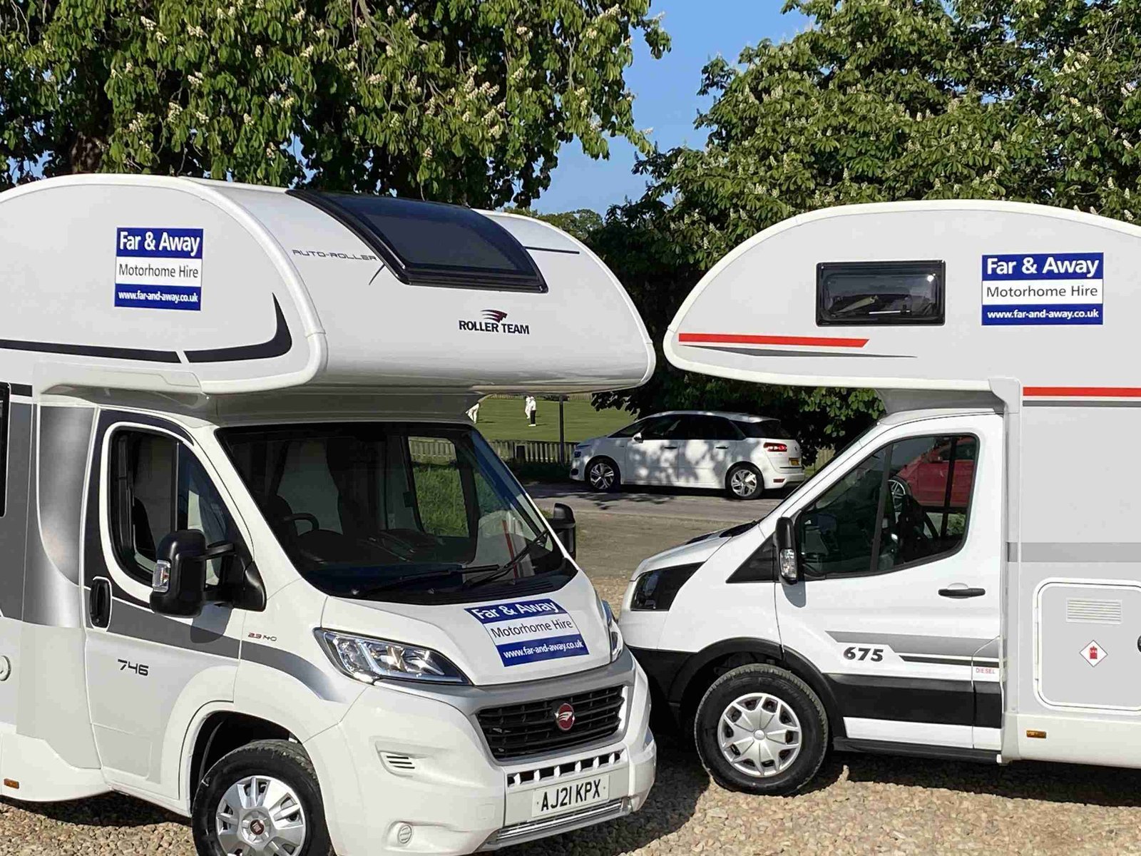 PIcture showing two motorhomes from Far and Away Motorhomes